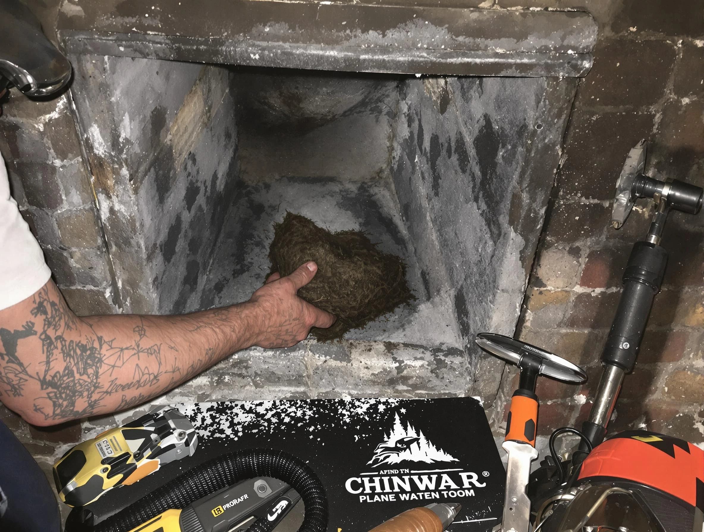 Columbia Chimney Sweep safely removing debris and screening chimney in Columbia, TN